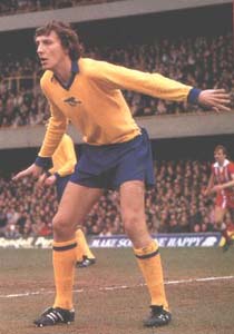Sammy Nelson smiling in Arsenal colours